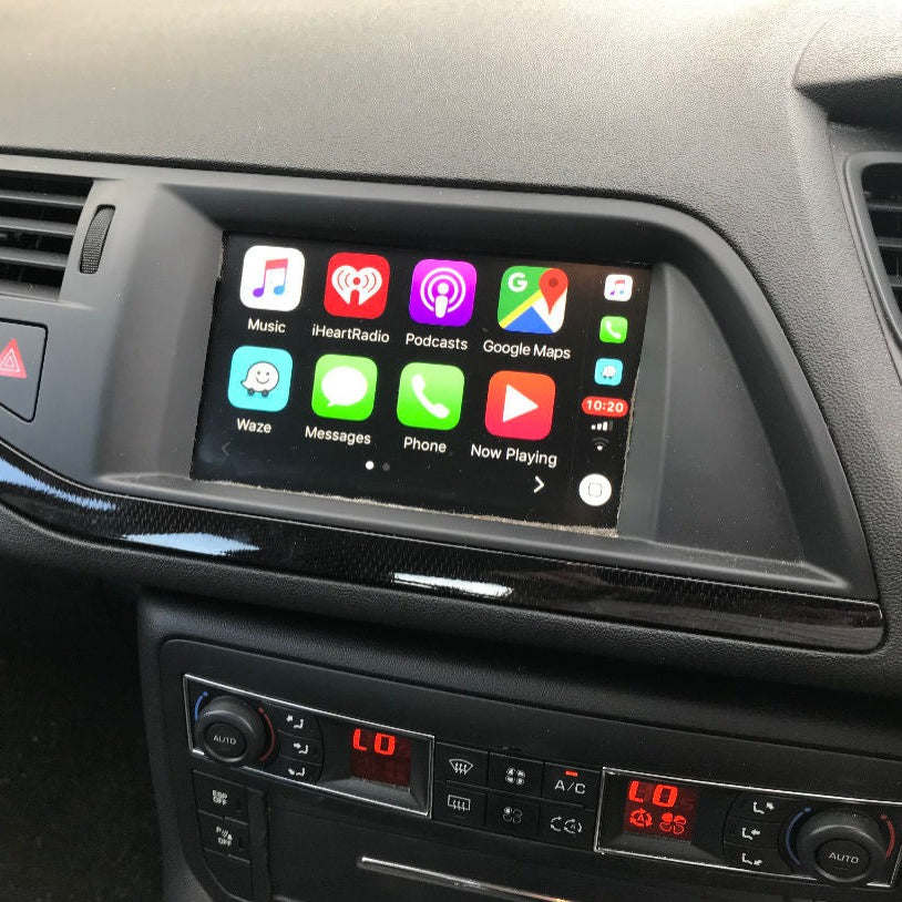 Citroen interior screen showing wireless CarPlay or Android Auto interface with multiple applications.
